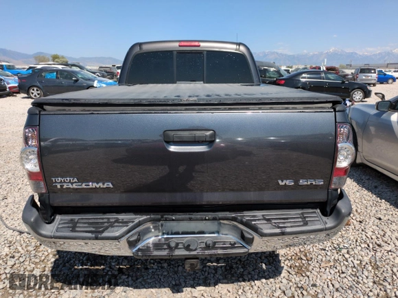 2012 Toyota Tacoma z VIN 5TFUU4EN2CX046135, wystawiony jako Copart lot #59400405 z przebiegiem 105 033 mil mil oraz Szkoda całkowita • Salvage title. Historia ofert i sprzedaży dostępna na DreamBid. Obrazek 6.
