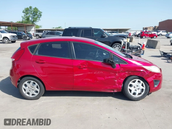 2012 Ford Fiesta SE z VIN 3FADP4EJ9CM140948, wystawiony jako IAAI lot #42301818 z przebiegiem 109 276 mil mil oraz . Historia ofert i sprzedaży dostępna na DreamBid. Obrazek 14.