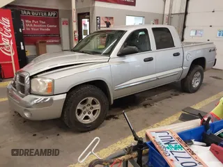 2005 Dodge Dakota Laramie with VIN 1D7HW58N75S188127, listed as a IAAI auction lot 41209206 with 117,480 mi miles and . Bid and sale history available at DreamBid. Image 18.