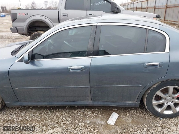 2005 Infiniti G35 Sedan with VIN JNKCV51E45M203607, listed as a IAAI auction lot 41556511 with 223011 miles. Bid and sale history available at carsss.com. Image 14.