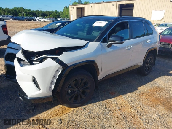 2023 Toyota RAV4 Hybrid XSE with VIN 2T3E6RFV1PW038080, listed as a IAAI auction lot 42518107 with 14,430 mi miles and . Bid and sale history available at DreamBid. Image 20.