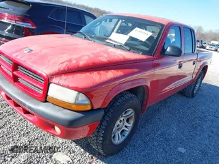 2003 Dodge Dakota Sport with VIN 1D7HL38N73S299948, listed as a IAAI auction lot 41392261 with 271,377 mi miles. Bid and sale history available at carsss.com. Image 2.