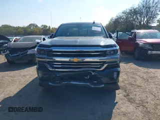 2018 Chevrolet Silverado 1500 High Country with VIN 3GCUKTEC8JG308353, listed as a IAAI auction lot 40714183 with 88,711 mi miles and . Bid and sale history available at DreamBid. Image 12.