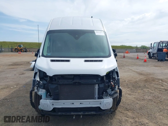 2022 Ford Transit Cargo with VIN 1FTBW3XG9NKA84214, listed as a IAAI auction lot 42033413 with 6,746 mi miles and . Bid and sale history available at DreamBid. Image 13.