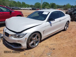 2014 BMW 4 Series 435i z VIN WBA3T3C5XEP737022, wystawiony jako IAAI lot #42135541 z przebiegiem 70 080 mil mil oraz . Historia ofert i sprzedaży dostępna na DreamBid. Obrazek 2.
