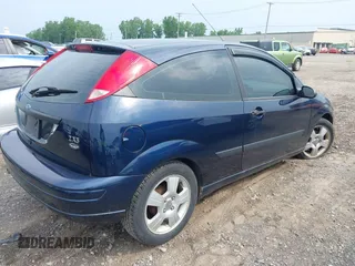 2003 Ford Focus ZX3 with VIN 3FAFP31313R104703, listed as a IAAI auction lot 42487996 with 91,526 mi miles and . Bid and sale history available at DreamBid. Image 4.