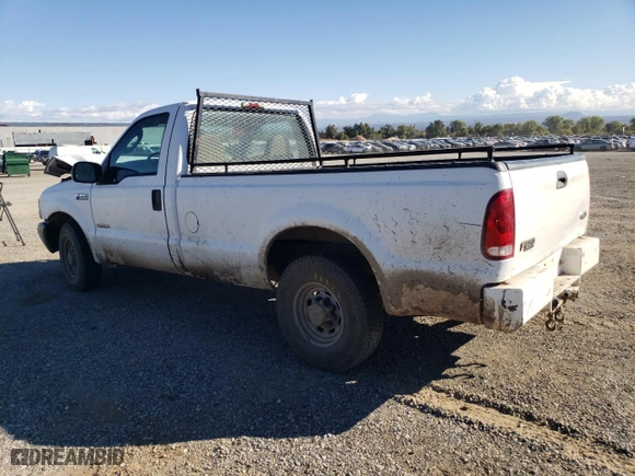2004 Ford Super Duty F-250 XL with VIN 1FTNF20P94EC21733, listed as a Copart auction lot 76788064 with 165,461 mi miles and Salvage Title. Bid and sale history available at carsss.com. Image 2.