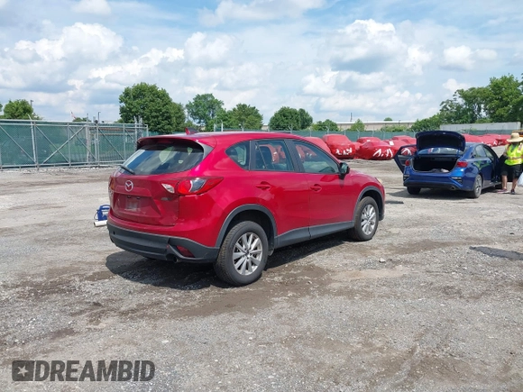 2015 Mazda CX-5 Sport with VIN JM3KE4BY5F0502121, listed as a IAAI auction lot 42652276 with 192,462 mi miles and . Bid and sale history available at DreamBid. Image 4.