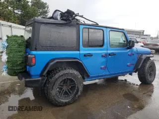 2023 Jeep Wrangler Sport S with VIN 1C4HJXDNXPW543376, listed as a Copart auction lot 86488024 with 35,935 mi miles and Salvage Title. Bid and sale history available at DreamBid. Image 3.