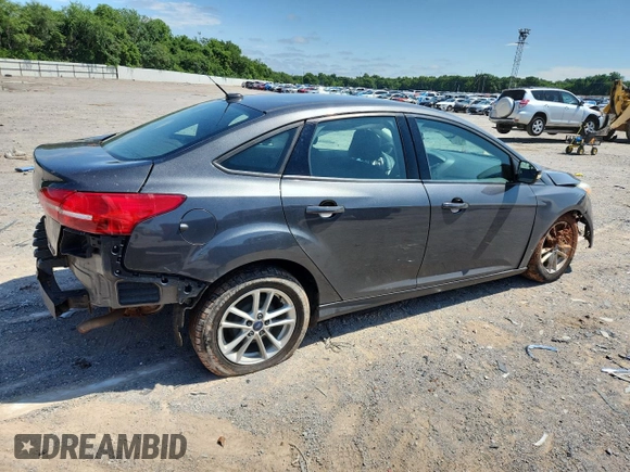 2016 Ford Focus SE with VIN 1FADP3F28GL321967, listed as a Copart auction lot 59556735 with 72,684 mi miles and Salvage title. Bid and sale history available at DreamBid. Image 3.