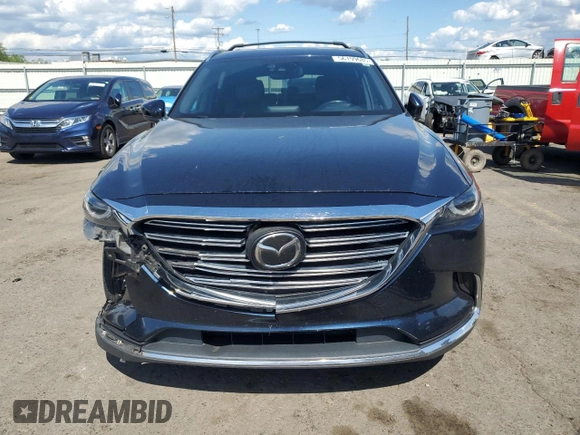 2017 Mazda CX-9 Grand Touring z VIN JM3TCBDY8H0131941, wystawiony jako Copart lot #56199685 z przebiegiem 166 080 mil mil oraz Szkoda całkowita • Salvage title. Historia ofert i sprzedaży dostępna na DreamBid. Obrazek 5.