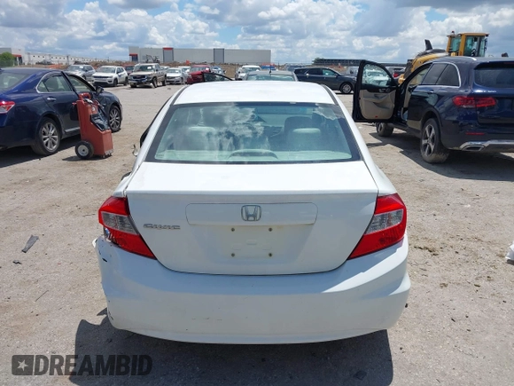 2012 Honda Civic LX z VIN 2HGFB2F57CH536142, wystawiony jako IAAI lot #42194088 z przebiegiem 108 293 mil mil oraz . Historia ofert i sprzedaży dostępna na DreamBid. Obrazek 15.