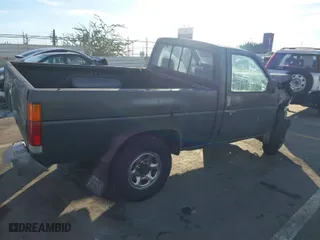 1993 Nissan Trucks 4WD with VIN 1N6SD11Y6PC315446, listed as a IAAI auction lot 41276307 with 202,981 mi miles. Bid and sale history available at carsss.com. Image 4.