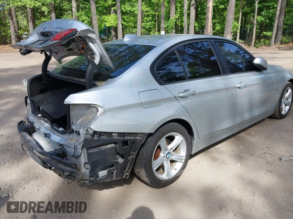 2015 BMW 3 Series 328i with VIN WBA3A5C55FF608033, listed as a IAAI auction lot 42144168 with 126,808 mi miles and . Bid and sale history available at DreamBid. Image 4.