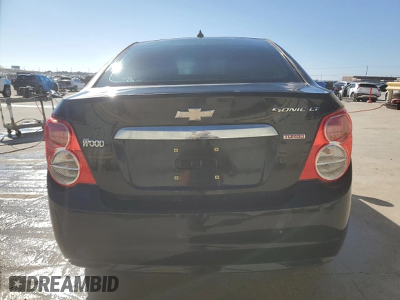 2013 Chevrolet Sonic LT with VIN 1G1JC5SB2D4145975, listed as a Copart auction lot 43541885 with 218,830 mi miles and Salvage Title. Bid and sale history available at DreamBid. Image 6.