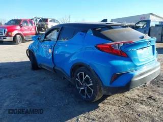 2019 Toyota C-HR XLE with VIN JTNKHMBX9K1056627, listed as a IAAI auction lot 41030089 with 1 mi miles. Bid and sale history available at carsss.com. Image 3.