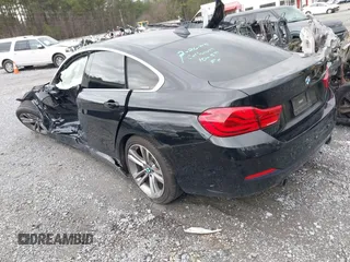 2019 BMW 4 Series 440i with VIN WBA4J5C53KBM65265, listed as a IAAI auction lot 41720126 with 73,365 mi miles and . Bid and sale history available at DreamBid. Image 3.