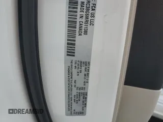 2021 Chrysler Pacifica Touring L with VIN 2C4RC3BG6MR511380, listed as a Copart auction lot 54237075 with 92,172 mi miles and Salvage title. Bid and sale history available at DreamBid. Image 13.