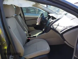 2015 Ford Focus SE with VIN 1FADP3F29FL268677, listed as a IAAI auction lot 42037244 with 118,018 mi miles. Bid and sale history available at carsss.com. Image 5.