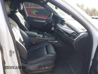 2015 BMW X6 xDrive35i with VIN 5UXKU2C50F0N77117, listed as a IAAI auction lot 41901159 with 104,820 mi miles. Bid and sale history available at carsss.com. Image 5.