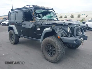 2014 Jeep Wrangler Unlimited Rubicon with VIN 1C4BJWFGXEL172622, listed as a IAAI auction lot 41782796 with 67,594 mi miles. Bid and sale history available at carsss.com. Image 1.