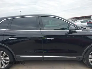 2018 Lincoln MKX Reserve with VIN 2LMPJ8LP3JBL18035, listed as a IAAI auction lot 42465412 with 114,157 mi miles and . Bid and sale history available at DreamBid. Image 13.