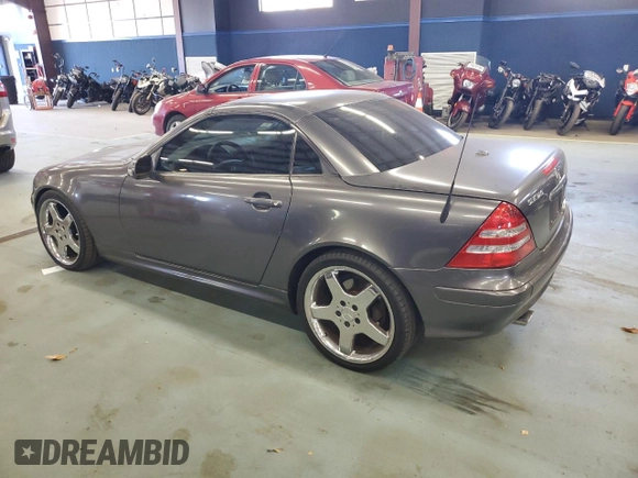 2003 Mercedes-Benz SLK 320 with VIN WDBKK65F83F280656, listed as a Copart auction lot 79158954 with 99,413 mi miles and Salvage title. Bid and sale history available at DreamBid. Image 2.