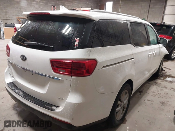 2019 Kia Sedona LX with VIN KNDMB5C11K6500813, listed as a IAAI auction lot 41570570 with 104,480 mi miles. Bid and sale history available at carsss.com. Image 4.