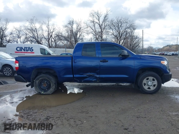 2014 Toyota Tundra SR with VIN 5TFUM5F17EX056082, listed as a IAAI auction lot 41884095 with 155,036 mi miles and . Bid and sale history available at DreamBid. Image 13.