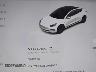 2020 Tesla Model 3 Standard Range Plus with VIN 5YJ3E1EA5LF613002, listed as a IAAI auction lot 42129085 with 55,672 mi miles. Bid and sale history available at carsss.com. Image 16.