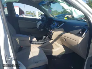 2018 Hyundai Tucson SE with VIN KM8J23A42JU627533, listed as a IAAI auction lot 41880112 with 61,840 mi miles. Bid and sale history available at carsss.com. Image 5.