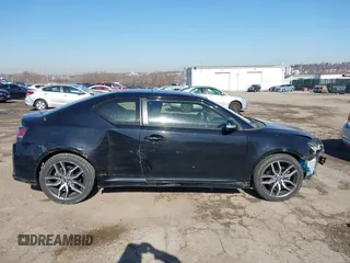 2014 Scion tC with VIN JTKJF5C78E3074094, listed as a IAAI auction lot 41828785 with 164,976 mi miles. Bid and sale history available at carsss.com. Image 6.