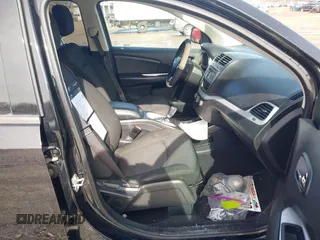 2019 Dodge Journey SE with VIN 3C4PDCBB1KT694545, listed as a IAAI auction lot 41642930 with 103,935 mi miles and . Bid and sale history available at DreamBid. Image 5.