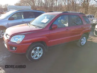 2009 Kia Sportage LX with VIN KNDJE723997634014, listed as a IAAI auction lot 41452224 with 148,643 mi miles. Bid and sale history available at carsss.com. Image 2.