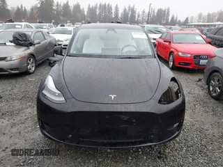 2024 Tesla Model Y Long Range z VIN 7SAYGDEE4RF014480, wystawiony jako IAAI lot #41979686 z przebiegiem 13 829 mil mil oraz . Historia ofert i sprzedaży dostępna na DreamBid. Obrazek 13.