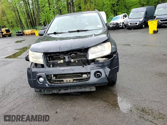 2006 Suzuki Grand Vitara Luxury with VIN JS3TD947364101307, listed as a Copart auction lot 55037585 with 198,616 mi miles and Salvage title. Bid and sale history available at DreamBid. Image 15.
