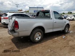 2002 Ford F-150 XL with VIN 1FTRF17242NB04340, listed as a Copart auction lot 58119345 with 218,734 mi miles and Non repairable. Bid and sale history available at DreamBid. Image 3.