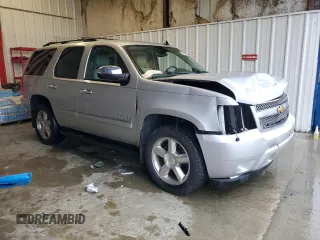 2012 Chevrolet Tahoe LTZ с VIN 1GNSKCE04CR272829, выставлен на аукционе Copart как лот 59959525 с пробегом 164 690 миль миль и Списание • Salvage title. История ставок и продаж доступна на DreamBid. Изображение 4.