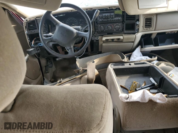 2002 Chevrolet Tahoe LS z VIN 1GNEC13Z92R175303, wystawiony jako Copart lot #54008725 z przebiegiem Nie podano mil oraz Szkoda całkowita • Salvage title. Historia ofert i sprzedaży dostępna na DreamBid. Obrazek 8.
