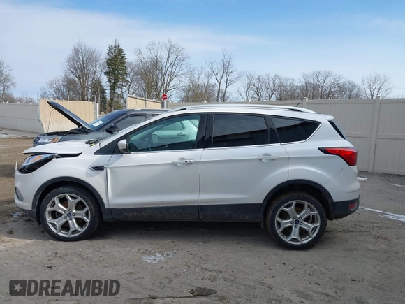 2019 Ford Escape Titanium with VIN 1FMCU9J97KUB85528, listed as a IAAI auction lot 41708344 with 88,841 mi miles. Bid and sale history available at carsss.com. Image 14.