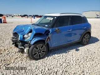 2011 MINI Countryman S with VIN WMWZC5C54BWL53955, listed as a Copart auction lot 52187405 with 124,470 mi miles and Salvage Title. Bid and sale history available at DreamBid. Image 1.