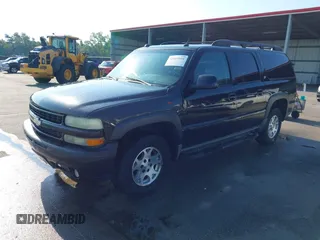 2004 Chevrolet Suburban LT z VIN 3GNFK16T64G278549, wystawiony jako IAAI lot #42569901 z przebiegiem 279 382 mil mil oraz . Historia ofert i sprzedaży dostępna na DreamBid. Obrazek 2.