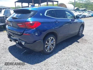 2020 BMW X2 sDrive28i with VIN WBXYH9C05L5P25132, listed as a IAAI auction lot 42269935 with 55,508 mi miles and . Bid and sale history available at DreamBid. Image 4.