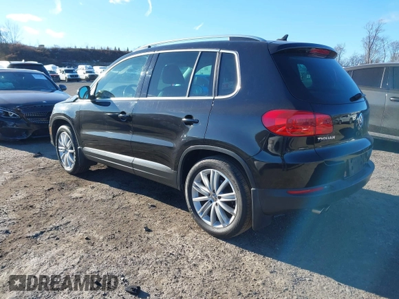2014 Volkswagen Tiguan S z VIN WVGBV3AX4EW581302, wystawiony jako IAAI lot #41033175 z przebiegiem 69 791 mil mil oraz . Historia ofert i sprzedaży dostępna na DreamBid. Obrazek 3.