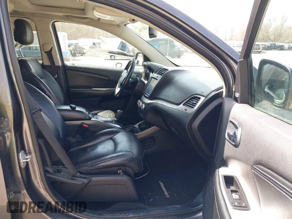 2014 Dodge Journey Limited with VIN 3C4PDDDG7ET138601, listed as a IAAI auction lot 42021766 with 214,220 mi miles and . Bid and sale history available at carsss.com. Image 5.