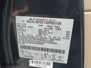 2008 Mazda Tribute Touring with VIN 4F2CZ02ZX8KM25983, listed as a IAAI auction lot 42122836 with 148,080 mi miles. Bid and sale history available at carsss.com. Image 9.