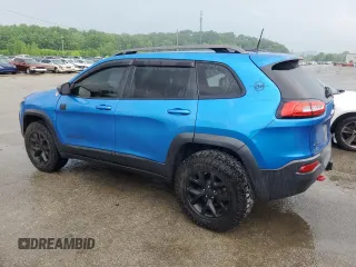 2017 Jeep Cherokee Trailhawk z VIN 1C4PJMBS1HW648716, wystawiony jako Copart lot #57490635 z przebiegiem 94 983 mil mil oraz Szkoda całkowita • Salvage title. Historia ofert i sprzedaży dostępna na DreamBid. Obrazek 2.