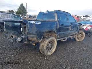 2020 Toyota Tacoma SR5 z VIN 5TFCZ5AN9LX216032, wystawiony jako IAAI lot #41448197 z przebiegiem 128 581 mil mil oraz . Historia ofert i sprzedaży dostępna na DreamBid. Obrazek 4.