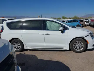 2023 Chrysler Pacifica Touring L with VIN 2C4RC1BG6PR531640, listed as a IAAI auction lot 42251680 with 31,638 mi miles and . Bid and sale history available at DreamBid. Image 13.