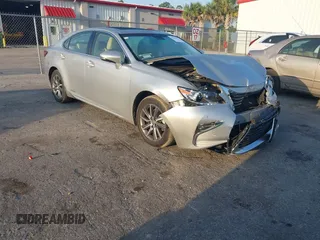 2016 Lexus ES 300h with VIN JTHBW1GG7G2115384, listed as a IAAI auction lot 42103591 with 86,598 mi miles and . Bid and sale history available at DreamBid. Image 1.